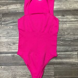New hot pink OQQ Bodysuit in a size XL.